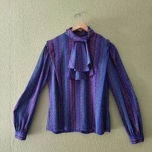 Vintage Nicola long sleeve blouse with bow detail.